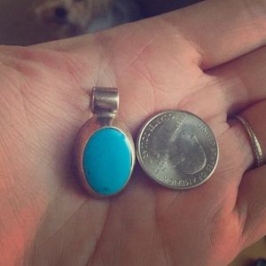 Turquoise slide/pendant.